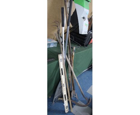 A Collection of Various Wooden Handled Garden Tools, to include Rake, Axe, Scythe, Hoe Etc 