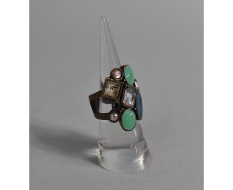 A Ladies Dress Ring Set with Nine Polished Paste Stones and Enamel 