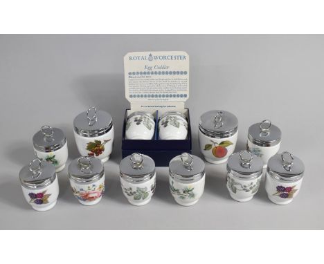 A Collection of Ten Small and Two Large Royal Worcester Egg Coddlers 