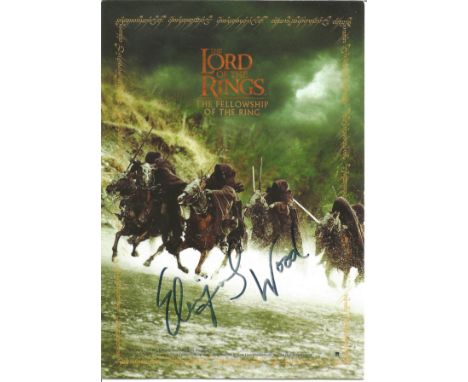 Elijah Wood signed 6x4 colour Lord of the Rings - fellowship of the ring postcard. Good Condition. All signed items come with