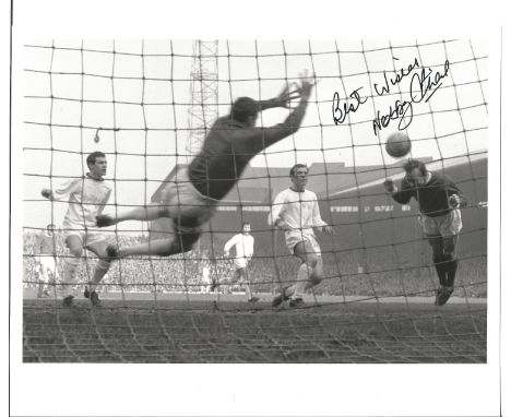 Football Nobby Stiles 10x8 signed B/W photo pictured scoring a rare headed goal for Manchester Utd. Stiles played for England