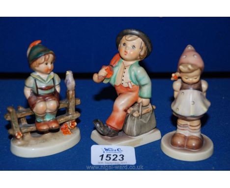 Three Hummel Goebel figures including 'Pretty Please' model 489, 'Meditation' model 13 and 'Boy with Umbrella'