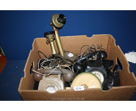 Three Telephones including candlestick type and a Chamberstick