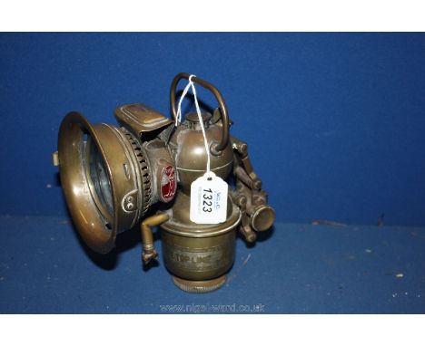 A superb ''Millers' Monarch British Made'' Brass Carbide Motorcycle head Lamp having diver's helmet style upper casing ''Mill