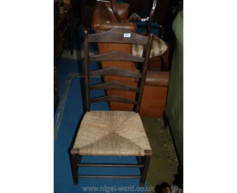 A stained Beech ladder back Bedroom Chair with seagrass seat, on turned legs and stretchers.