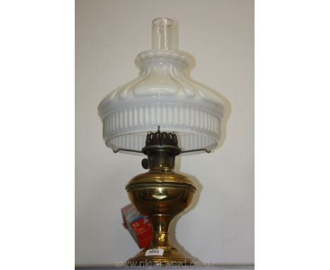 A Brass oil Lamp with large white shade