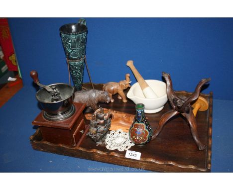 A quantity of miscellanea including coffee grinder, pestle and mortar, wooden bear and elephant, metal sailing ship, etc.