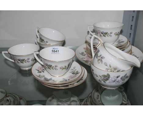 A Royal Worcester ''June Garland'' 1961 part Teaset including cake plate, six tea plates, six saucers, five cups, sugar bowl 