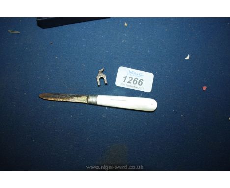 A mother of pearl Fruit Knife with silver blade and a white metal Charm