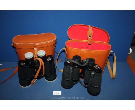 Two pairs of Binoculars, one 20 x 50 Field 3°, the other 10 x 50 lightweight by Zenith  