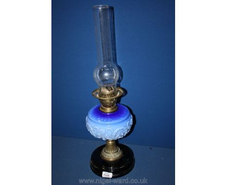 A table Oil Lamp with black base, bowl light and dark blue