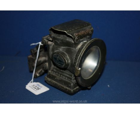 A ''Miller Make'' Bicycle/Motorcycle Paraffin head Lamp with red and green side prisms with the Miller make lighthouse trade 
