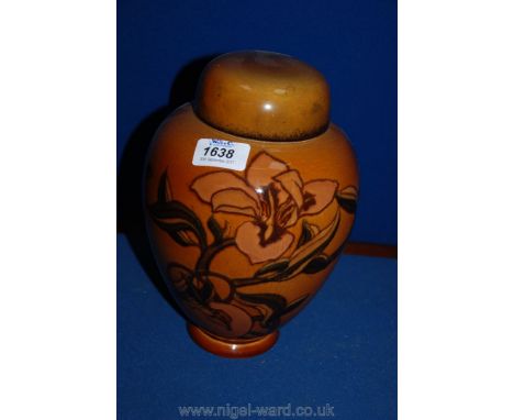 A Carltonware Ginger Jar with brown glaze 'Iris' decoration, 9 3/4'' tall.
