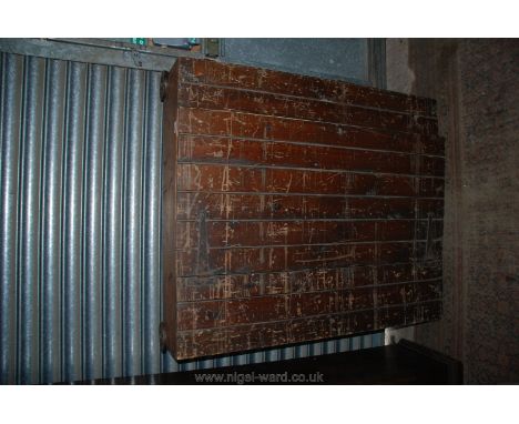 A Victorian Pine Under-bed Storage Box with iron handles and small spoked wheels with tongue and groove top.  46 1/4" wide x 