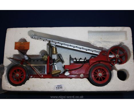 A boxed and unfired Mamod live steam ''Fire Engine FE1'' (burner absent) but equipped with rescue ladders