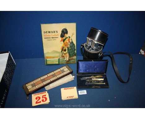 A small box of drawing instruments, a Grants triple hip flask, a Dewars desk calendar and two cribbage boards