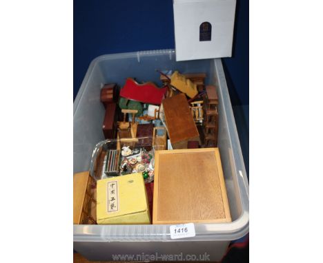 A good quantity of Doll's House Furniture including a four poster bed, red three piece suite, pots, pans, carpets, bookcase, 