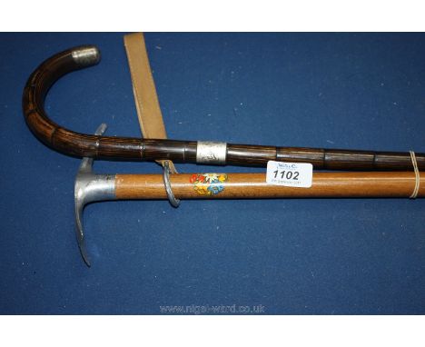 A silver banded Cane, London hallmark 1929 and an Alpine Walking Stick