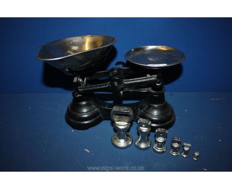 A pair of balance Scales and weights