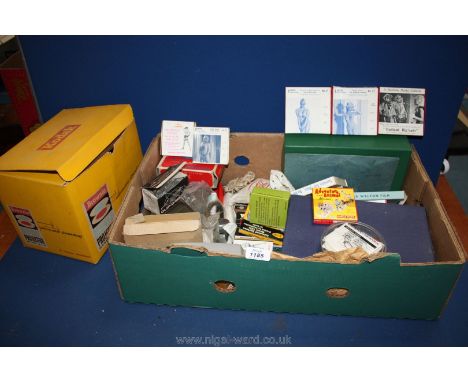 A quantity of Photographic equipment, cine films and slides including Kamera Cine films (risque), 'Gamblin Gal', Charlie Chap