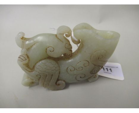 Pale green jade libation cup in the form of a stylised bird, 7.5cm x 10.5cm approximately