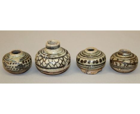 A GROUP OF FOUR SMALL THAI SAWANKHALOK CERAMIC JARLETS, 14th/16th Century, with various fish scale, scroll and speckled desig