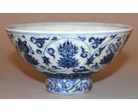 A CHINESE MING-STYLE BLUE & WHITE PORCELAIN BOWL, the sides decorated with a formal pattern of scroll stemmed lotus and ribbo