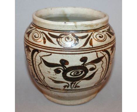 A GOOD 14TH CENTURY CHINESE YUAN DYNASTY CIZHOU SLIP PAINTED JAR, painted in brown on a cream ground with repeated panels of 
