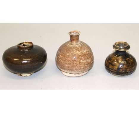 THREE SMALL SOUTH-EAST ASIAN CERAMIC VASES, 14th-16th Century, the tallest 3.1in high. (3)