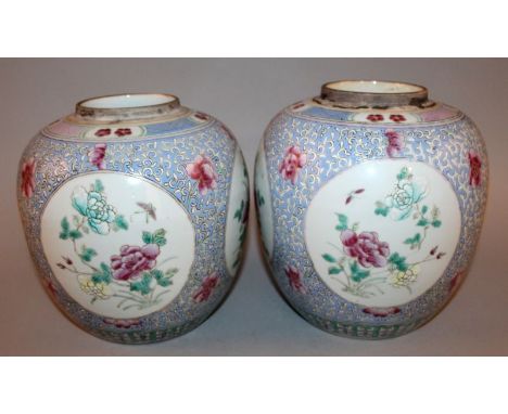 A GOOD PAIR OF 19TH CENTURY CHINESE FAMILLE ROSE PORCELAIN GINGER JARS, each jar painted with four circular floral panels, th