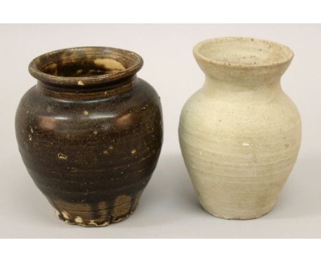 TWO SONG DYNASTY CERAMIC VASES, one with a brown glaze, the tallest 5.4in high. (2)