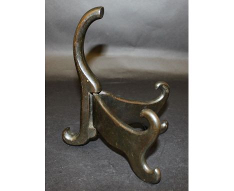A 19TH/20TH CENTURY CHINESE CARVED HARDWOOD DISH STAND, with scroll supports, 9in high.