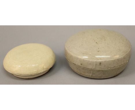 TWO SONG DYNASTY CERAMIC BOXES & COVERS, each cover with underglaze moulded floral decoration, the largest 4.25in diameter. (