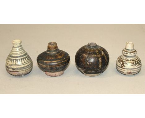A GROUP OF FOUR SMALL SOUTH-EAST ASIAN CERAMIC VASES, 14th/16th Century, the tallest 2.25in high. (4)