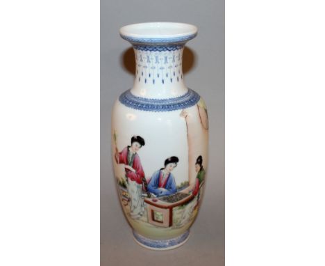 A 20TH CENTURY CHINESE FAMILLE ROSE PORCELAIN VASE, decorated with ladies playing a board game, the base with a Qianlong seal