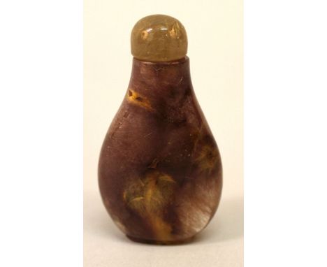 A GOOD UNUSUAL CHINESE QUARTZ SNUFF BOTTLE & STOPPER, of flattened pear-form, the stone of predominantly purple hue with ligh