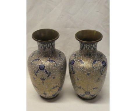 A pair of Chinese cloisonne enamelled tapered vases with blue and silver floral decoration, 9½" high