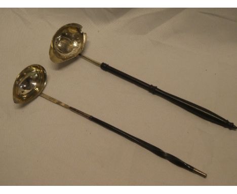 An 18th century silver oval toddy ladle inset with a 1761 coin and mounted with turned wood handle and one other Sheffield pl