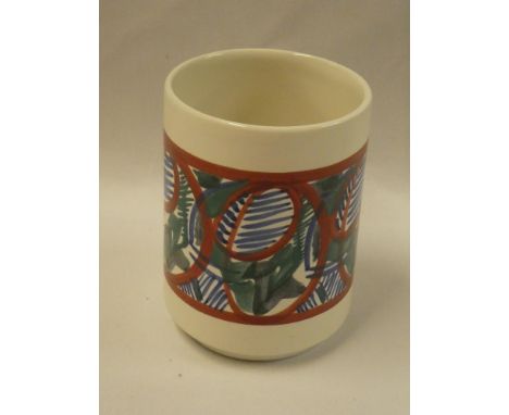 A 1970's Poole pottery cylindrical vase with painted leaf decoration by Wendy Smith, 5" high
