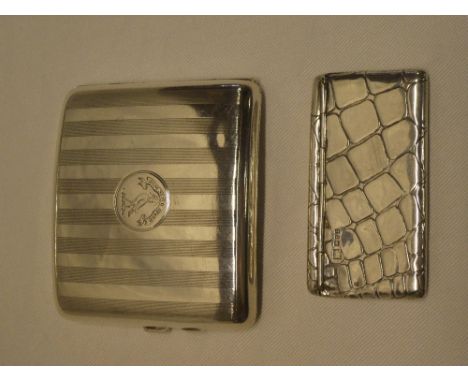 A George V silver rectangular concave cigarette case with engine turned decoration, Birmingham marks 1918 and a silver rectan