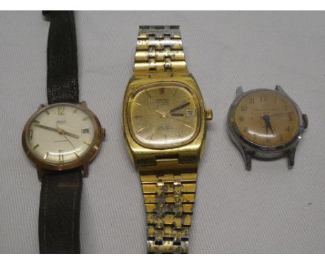 An Omega electronic gent's chronometer wrist watch in gilt mounts and two other various vintage wrist watches