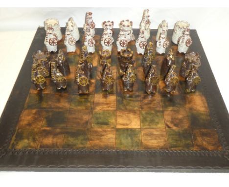 A Spanish Alfaraz Studio pottery chess set together with accompanying board 