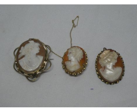 A pinchbeck oval cameo brooch with female portrait and two other various female decorated cameo brooches (3)