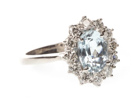 AQUAMARINE AND DIAMOND RING, the oval aquamarine 8x5mm, within a halo of round brilliant cut diamonds totalling approximately