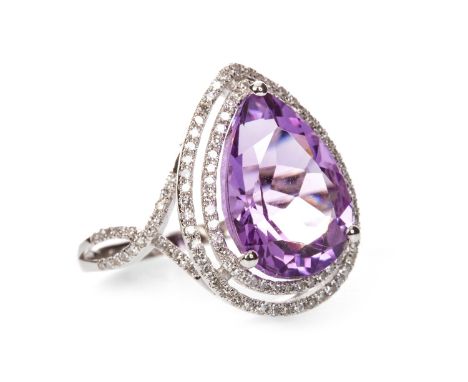 AMETHYST AND DIAMOND RING, the pear shaped amethyst of approximately 7.18 carats, within a double halo of round brilliant cut