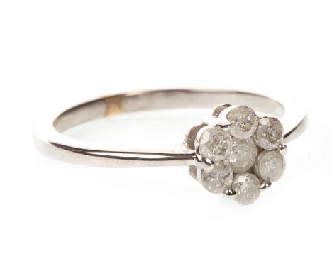 DIAMOND FLOWER CLUSTER RING, the round brilliant cut diamonds totalling approximately 0.50 carats, forming a daisy cluster, m