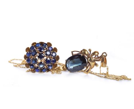 BLUE GEM SET RING, mid twentieth century, the tiered bezel 18.5mm wide, set with round faceted blue gems, marked 14K, size O,