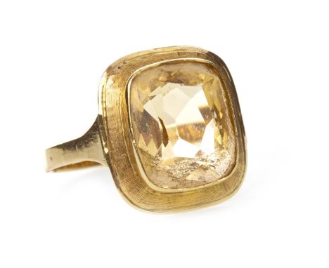 CITRINE SINGLE STONE RING, set with a rectangular faceted citrine 12mm long in a collet setting, unmarked, size P, 3.7g