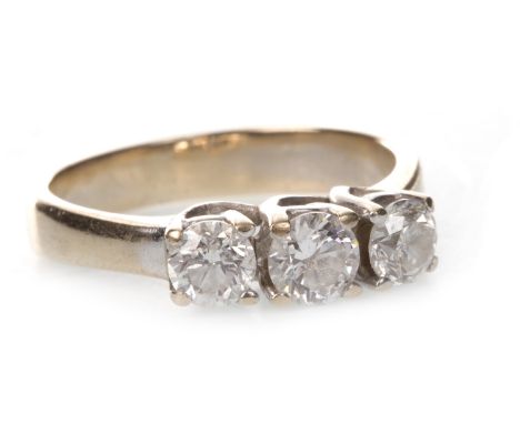 DIAMOND THREE STONE RING, the round brilliant cut diamonds totalling approximately 0.86 carats, unmarked, size L, 4g