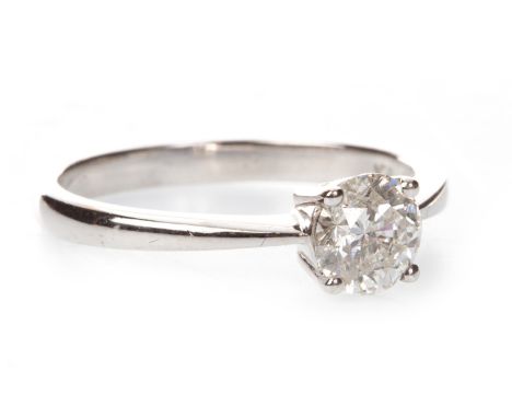 DIAMOND SOLITAIRE RING, the round brilliant cut diamond of approximately 0.75 carats, in eighteen carat gold, size O 1/2, 3.5